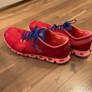 On cloud running shoes.  Red size 10.